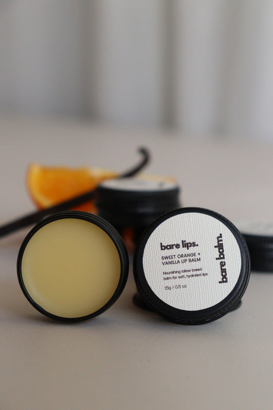 Bare Balm lip balm with a blurred background