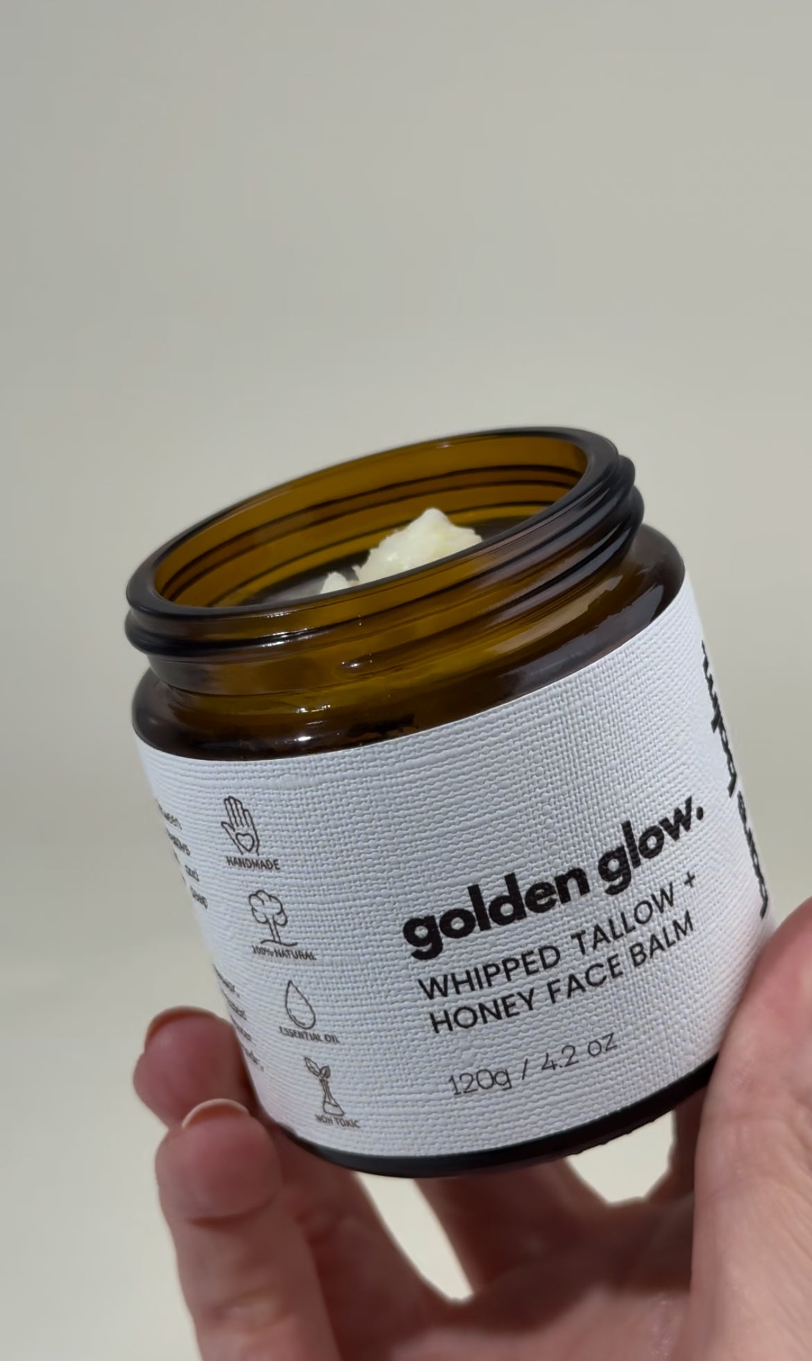 Tallow face balm melting into skin – hydrating natural skincare for dry and reactive skin